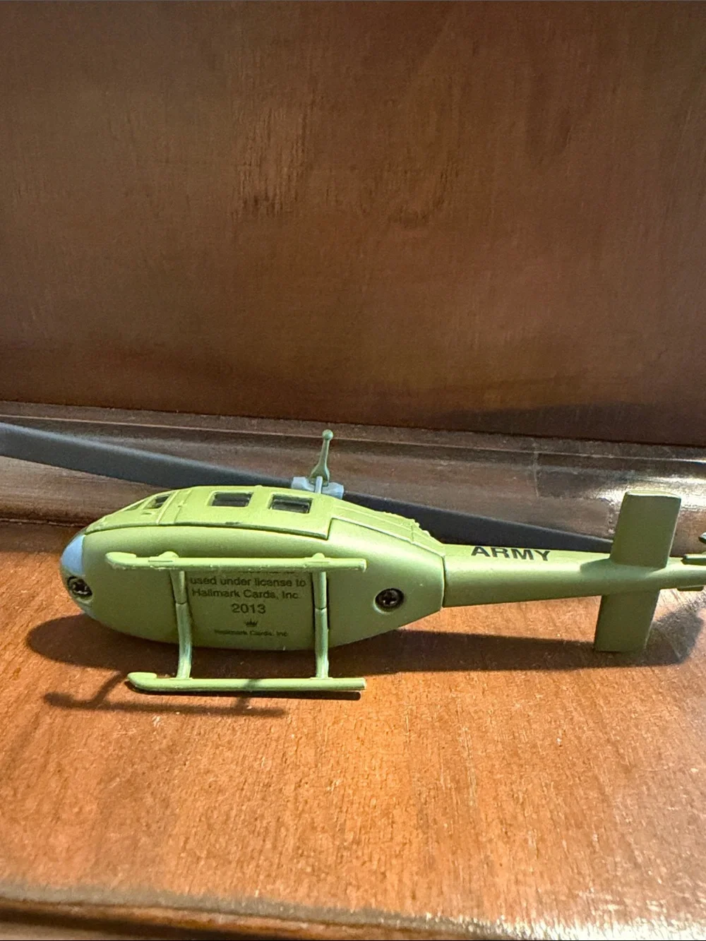 Hallmark green Army Huey helicopter keepsake ornament